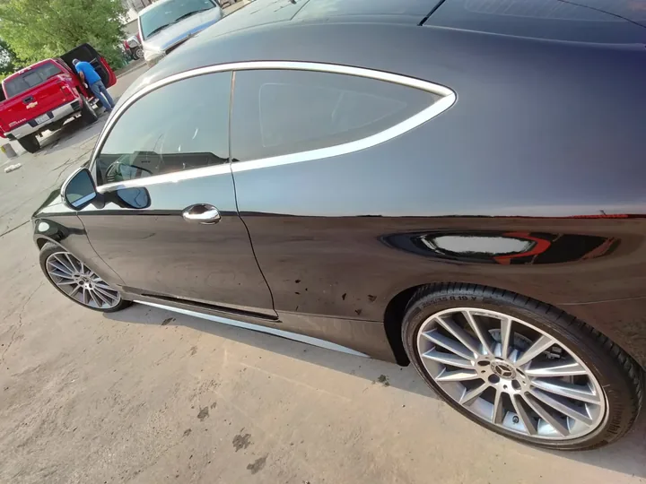Black Mercedes-Benz C-Class coupe after paint correction in Slaton, TX