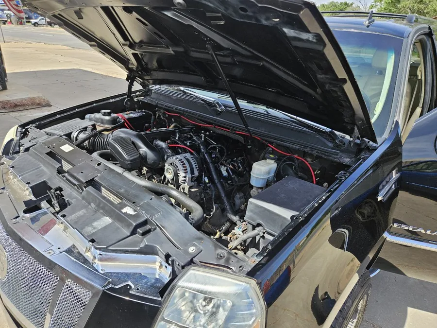 Cadillac Escalade engine bay degreased, cleaned and dressed in Slaton, TX