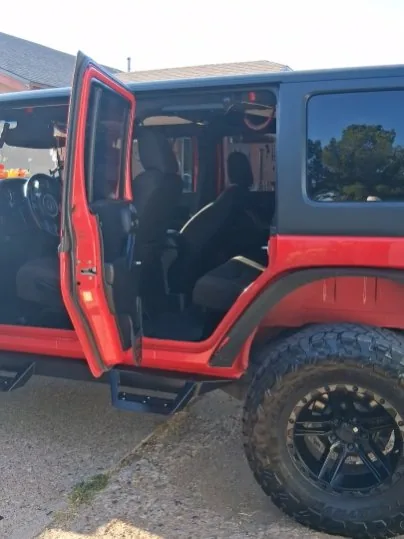 Jeep Wrangler with doors open showing a detailed interior in Slaton, TX
